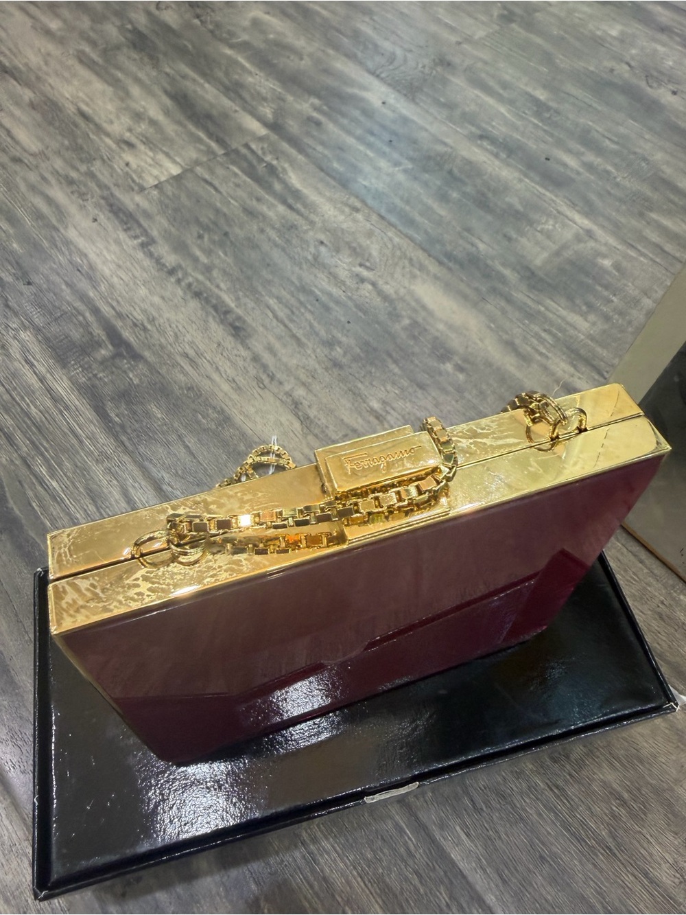 Salvatore Ferragamo Burgundy Patent Clutch with Gold Hardware